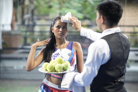 Padel fashion editorial featuring Bad Padel clothing on a padel court
