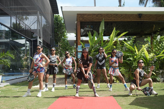Women's padel clothing on court — Bad Padel Co fashion shoot group
